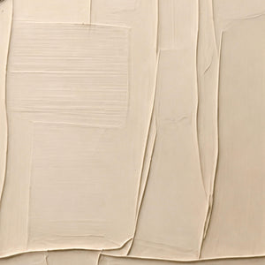 Close view of fine horizontal ridges and raised cream panel edges.