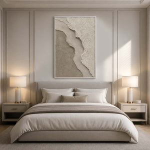 Calming sand and ivory wall art above a serene bedroom with a white frame.