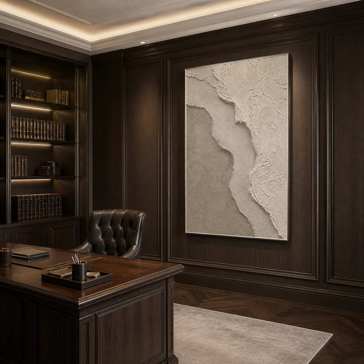 Textured minimalist wall art displayed in a sophisticated office with a silver frame.