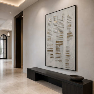 Quiet Lines Rise Through Stone in a black-framed entryway