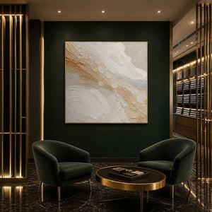Quiet gold orbits across ivory wall art in a contemporary hospitality lounge.