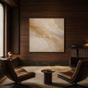 Quiet gold orbits across ivory wall art in a contemporary stair hall.