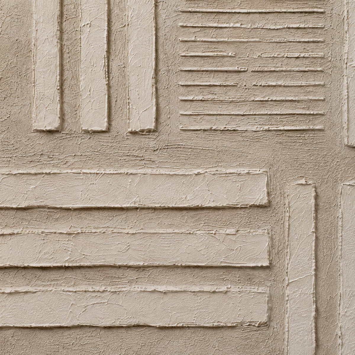 Close-up of raised geometric texture on neutral canvas.