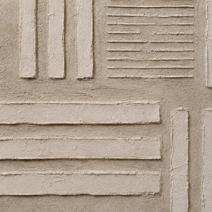 Close-up of raised geometric texture on neutral canvas.