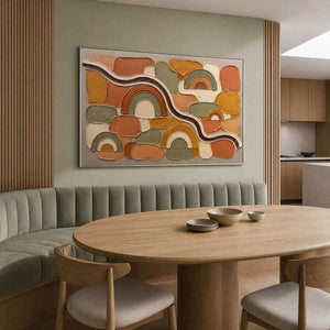 Terracotta rainbows and warm geometric blocks wall art in a contemporary dining room.