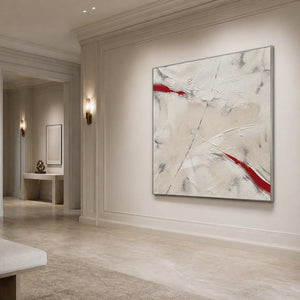 Red Cuts Through Stillness in a silver-framed bright entryway