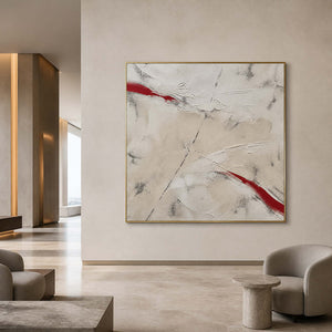Red Cuts Through Stillness in an elegant gold-framed lobby