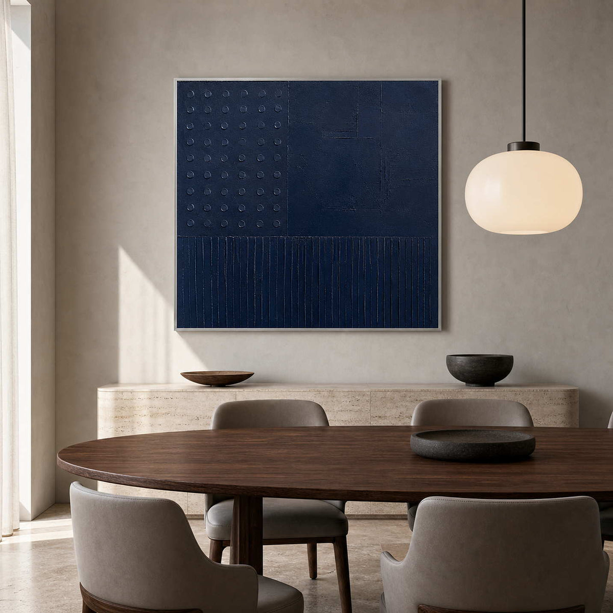 Textured navy artwork displayed in a refined walnut dining room.