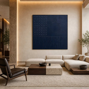 Large geometric blue artwork in a contemporary design hotel lobby.