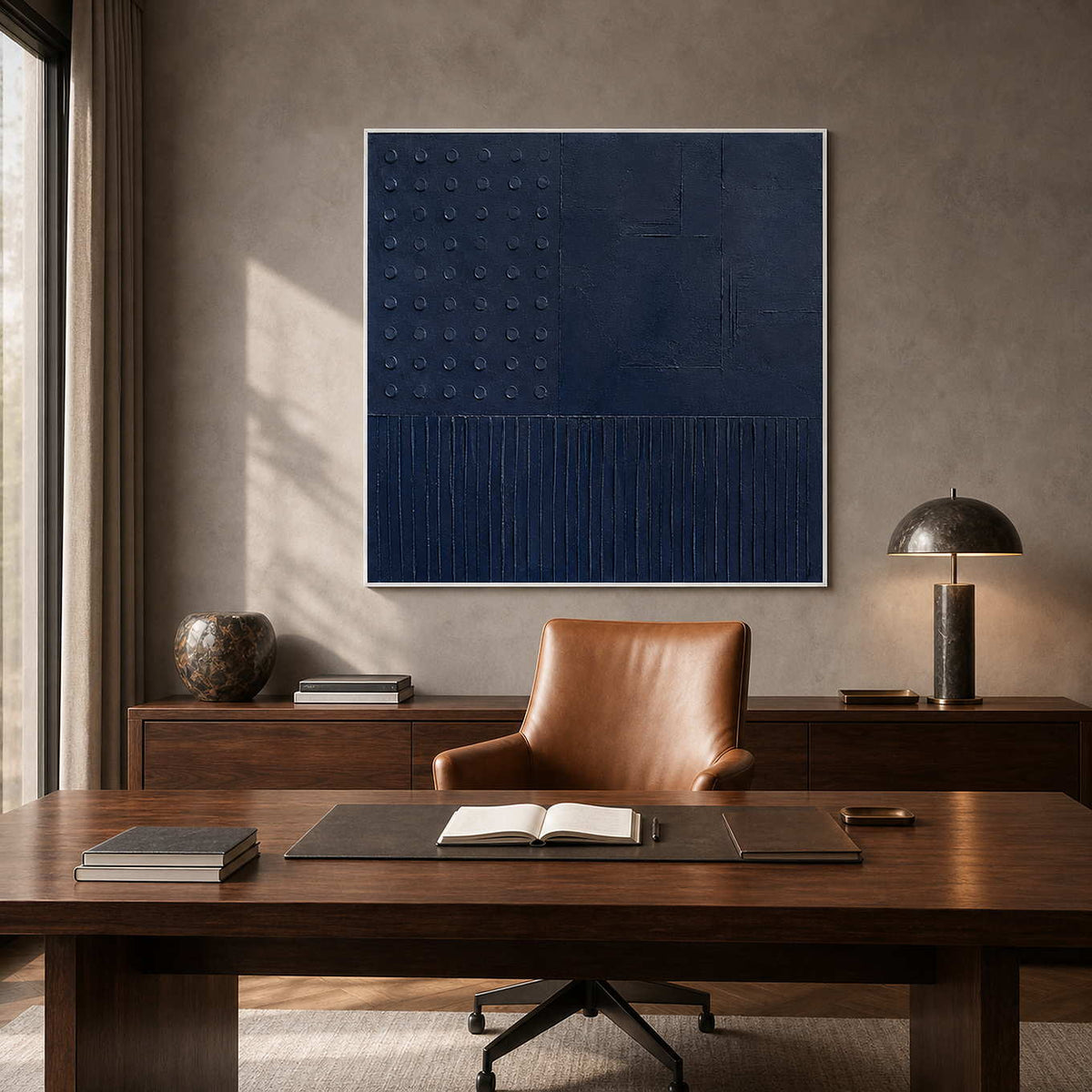 Sculptural blue abstract painting above a modern executive desk.