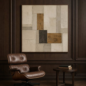Earth-toned geometric wall art displayed in a dark collector reading room.