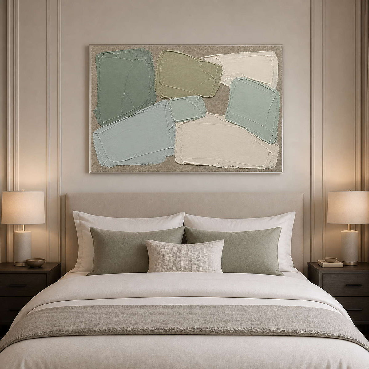 Sage and ivory abstract wall art styled above a neutral bed.