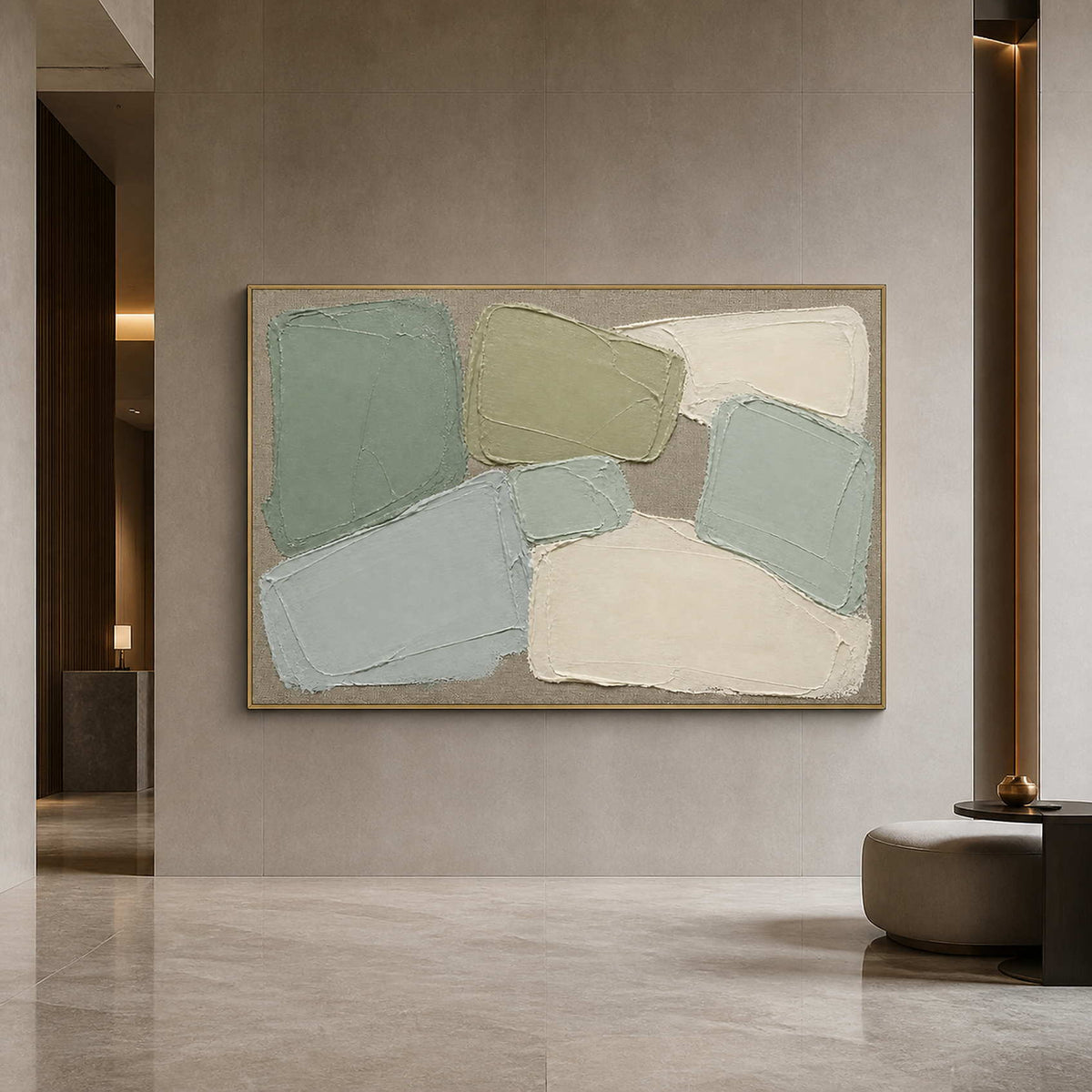 Textured sage abstract wall art displayed in a refined hotel lobby.