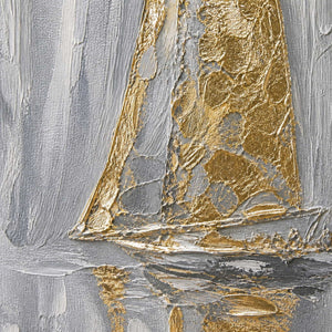 Close-up of raised gold texture across a sail and harbor reflection.