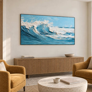 Blue and white wave above a slatted cabinet between two mustard armchairs.