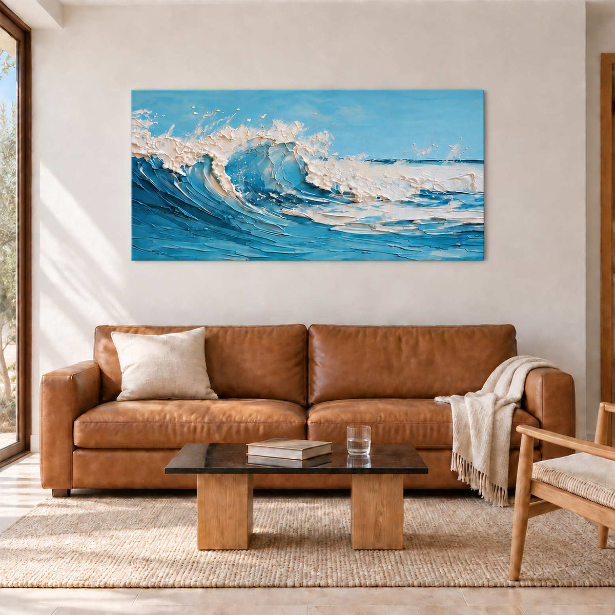 Blue wave painting above a brown sofa with a dark rectangular coffee table.
