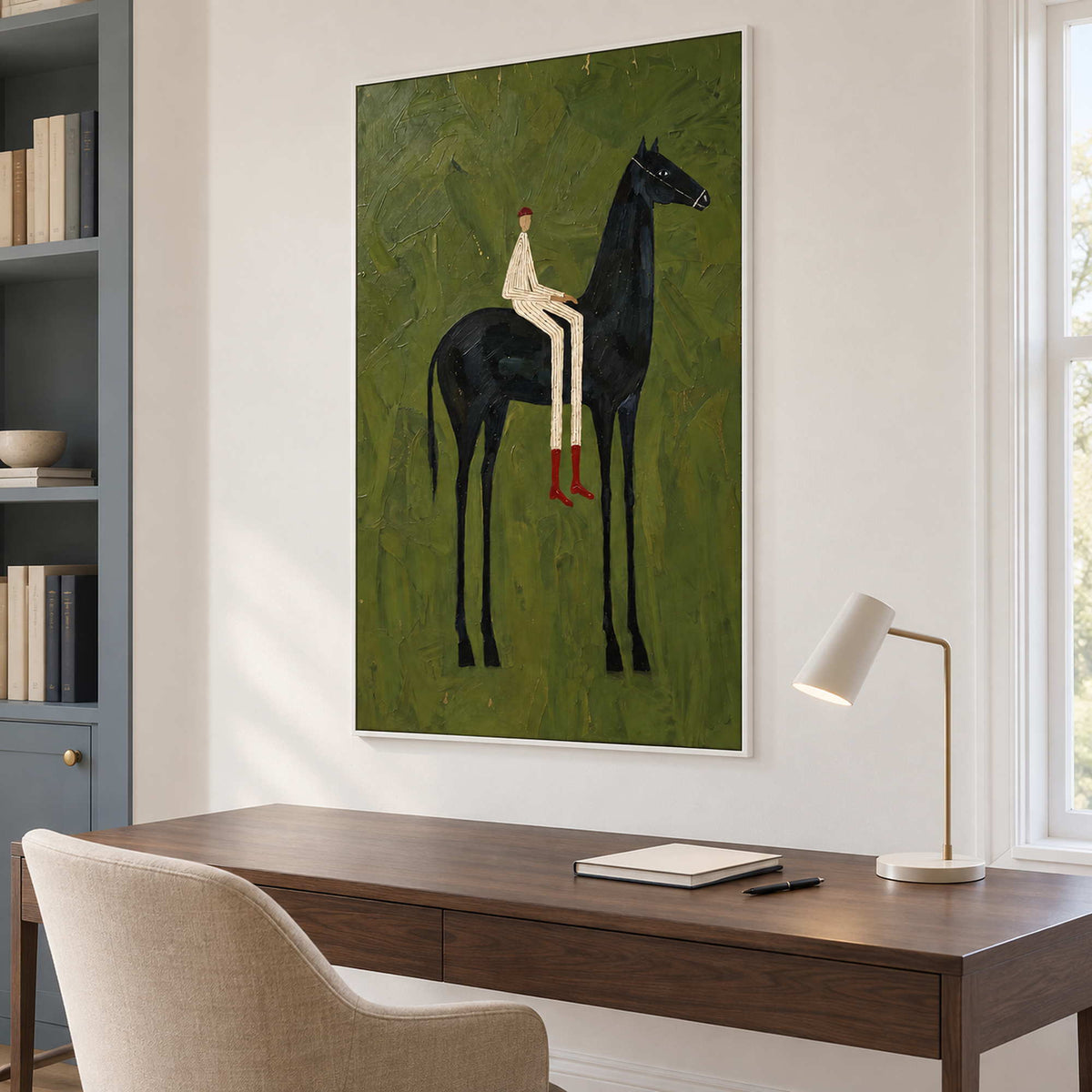 Striped rider painting above a wooden desk beside blue shelving.