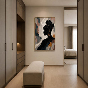 Black profile portrait displayed in an ivory smoked-oak dressing hall.