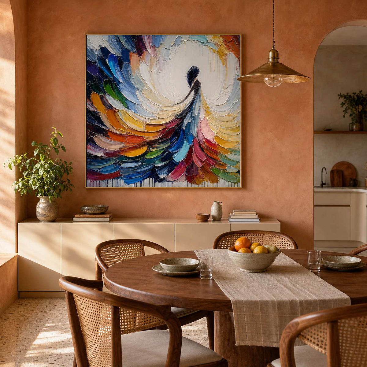 Colorful figurative canvas energizing a warm terracotta dining room.