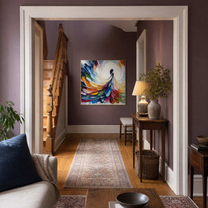 Multicolor figurative canvas creating a focal point in a stair hall.