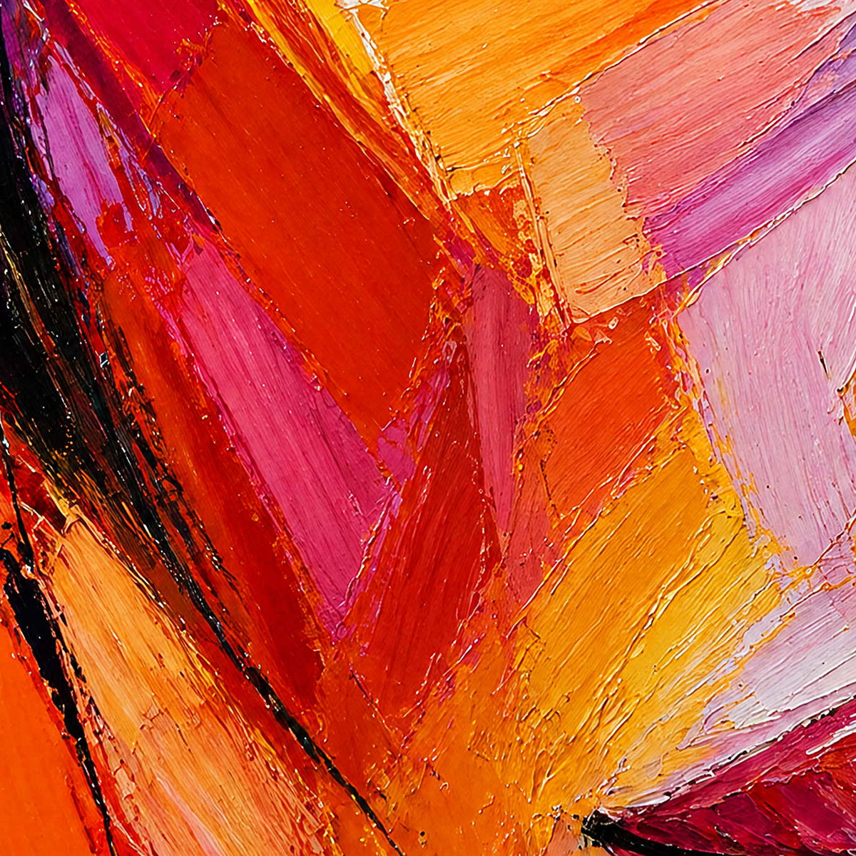 Close-up of layered coral, orange, pink, and black brush texture.
