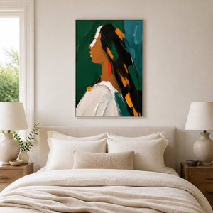 Bold green textured portrait canvas adds character above a neutral bed.