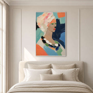 Textured fashion portrait brings soft color above a white bed.