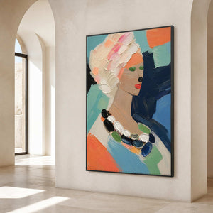 Modern female portrait creates a polished focal point in the hallway.