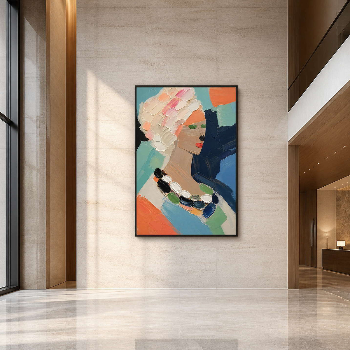 Graphic female portrait wall art displayed in a spacious hotel lobby.
