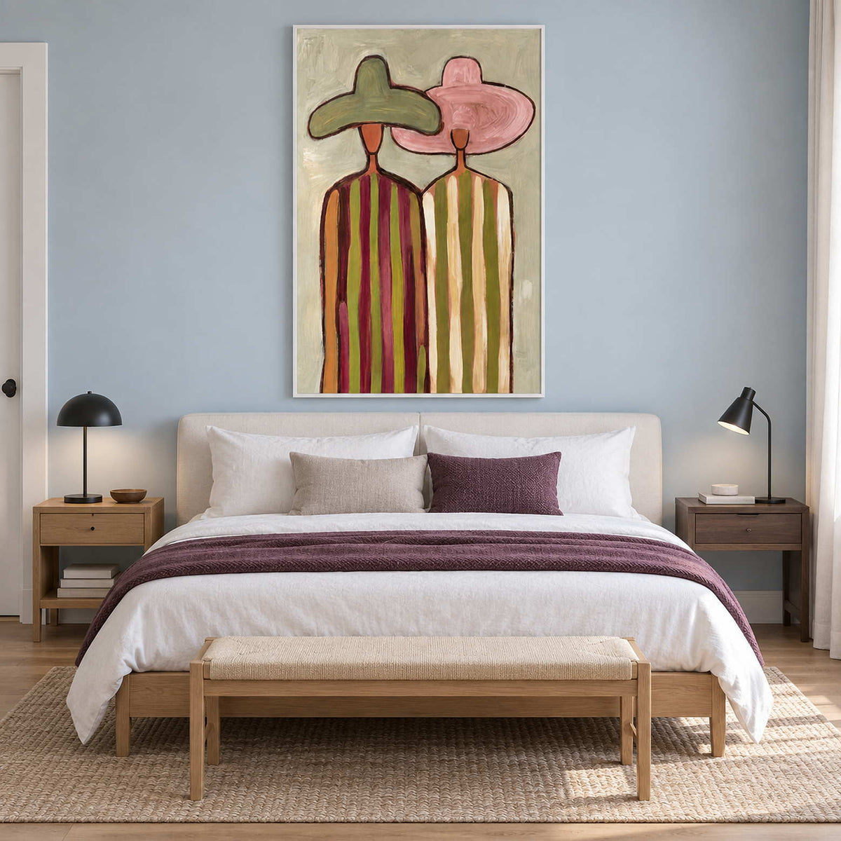 Pink-and-green hat painting on a blue bedroom wall.