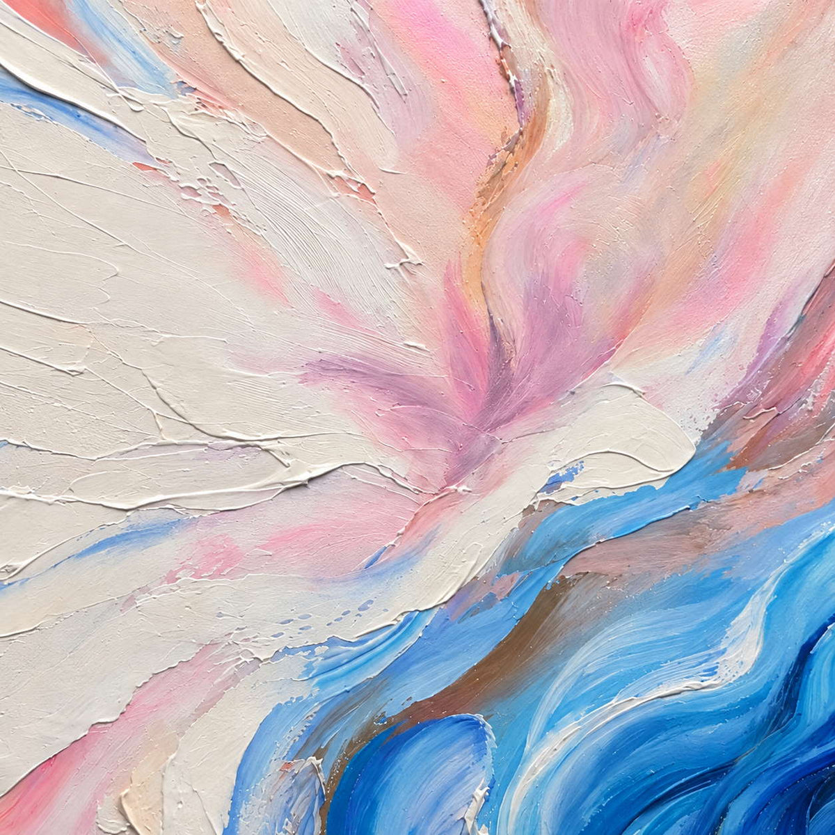 Close-up of raised cream and pink arcs meeting layered blue curves.