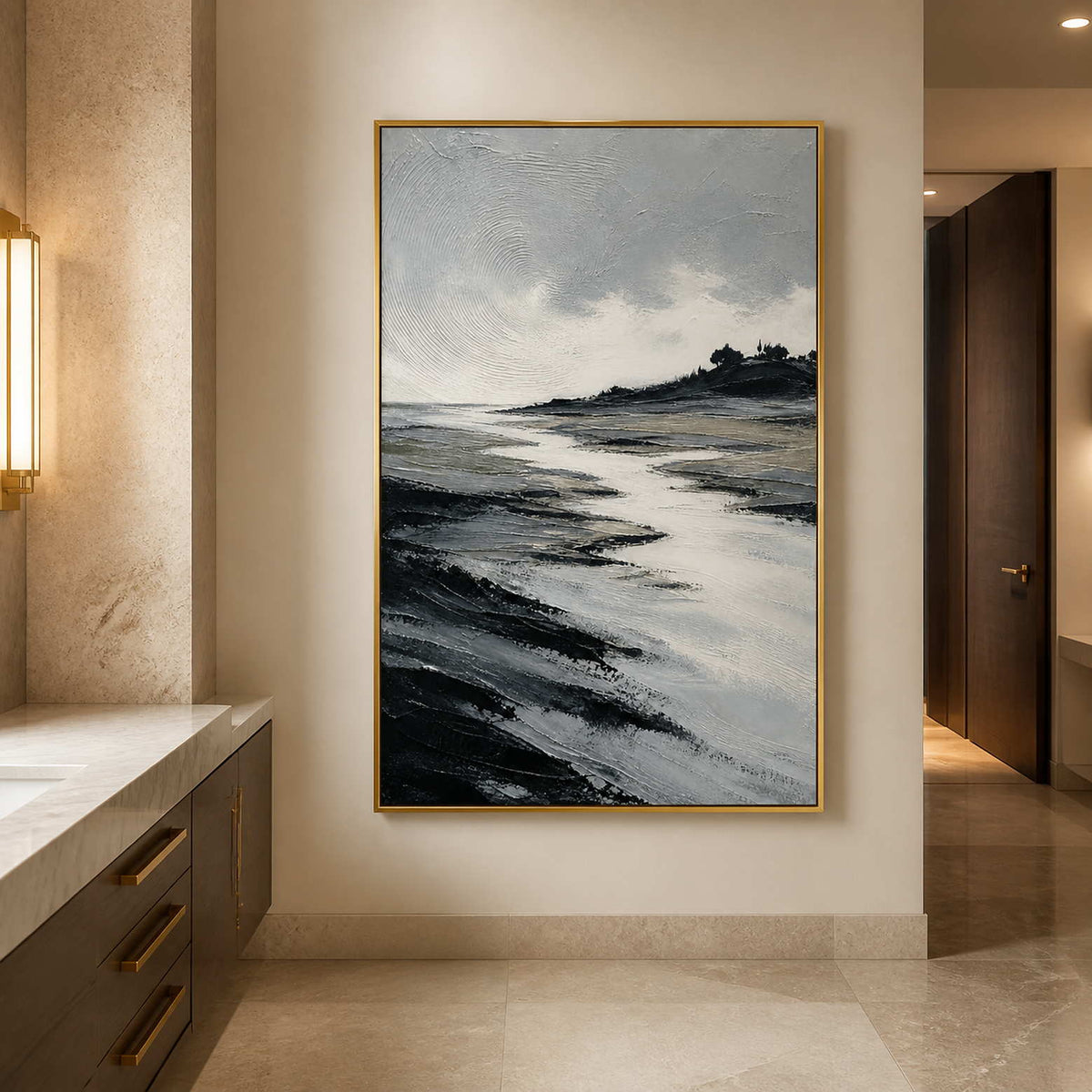 Vertical monochrome seascape wall art in a bathroom with a gold frame.