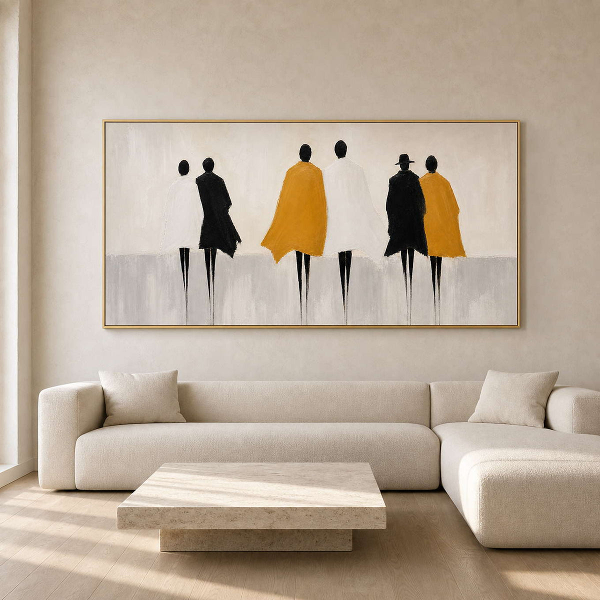 Minimalist figurative wall art above a warm neutral living room.