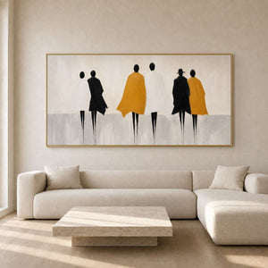 Minimalist figurative wall art above a warm neutral living room.