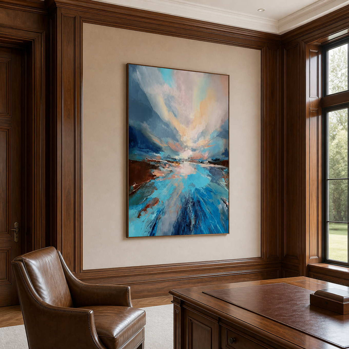 Wood framed blue landscape behind a wooden desk and brown leather office chair.