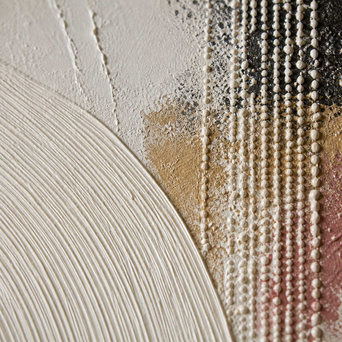 Close-up of carved ivory curves and rounded color relief.