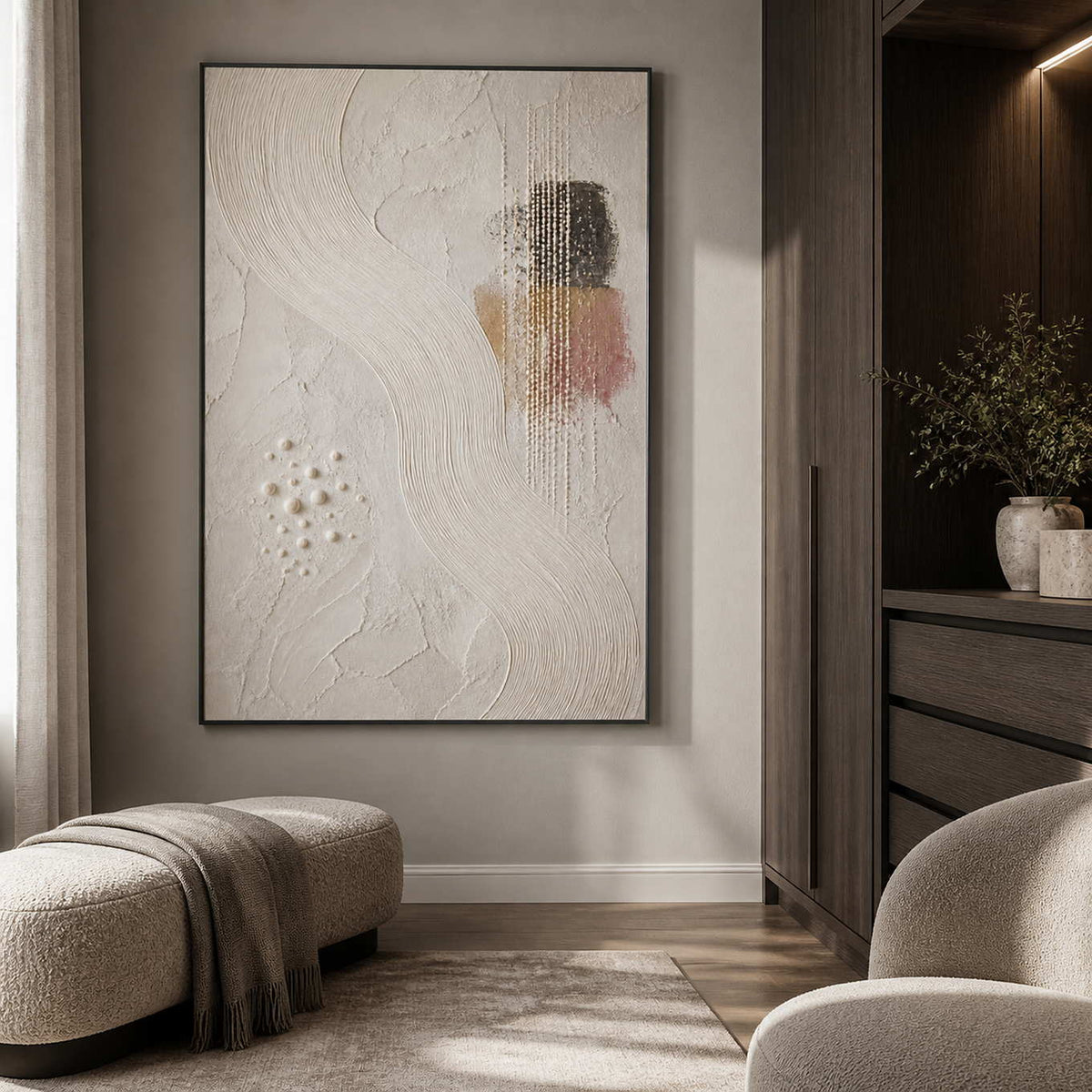 Textured ivory artwork displayed in a warm gray dressing room.