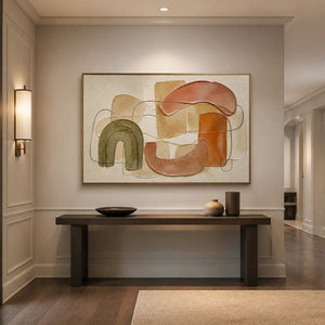 Horizontal boho wall art displayed above an entryway console.