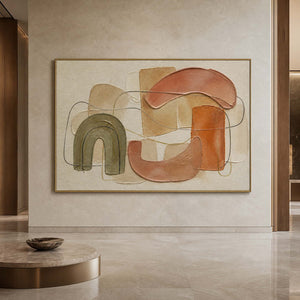 Earth tone abstract wall art displayed in a refined hotel lobby.