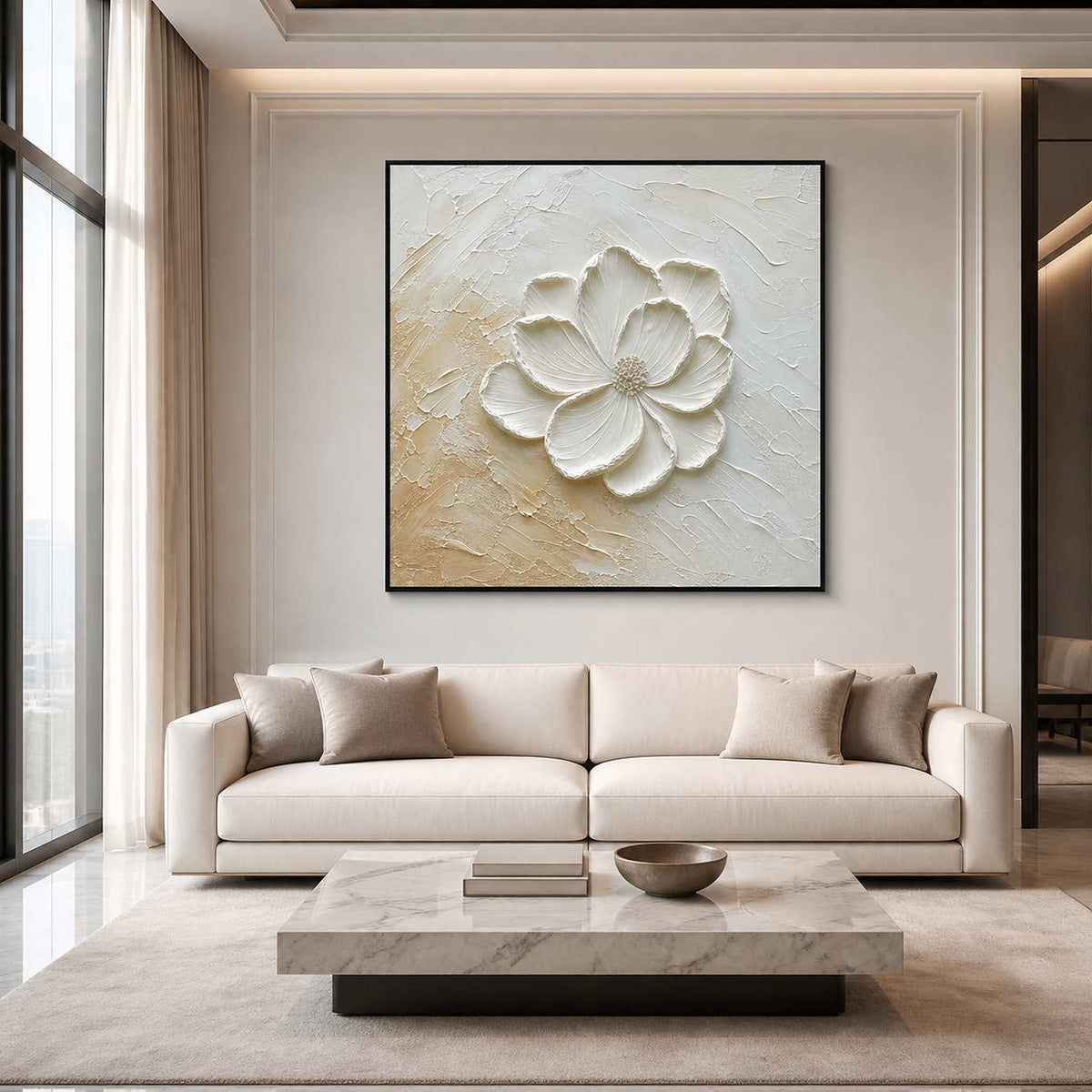 Soft Awakening in a black frame above a cream sofa, with a raised pale flower against an ivory and beige ground.