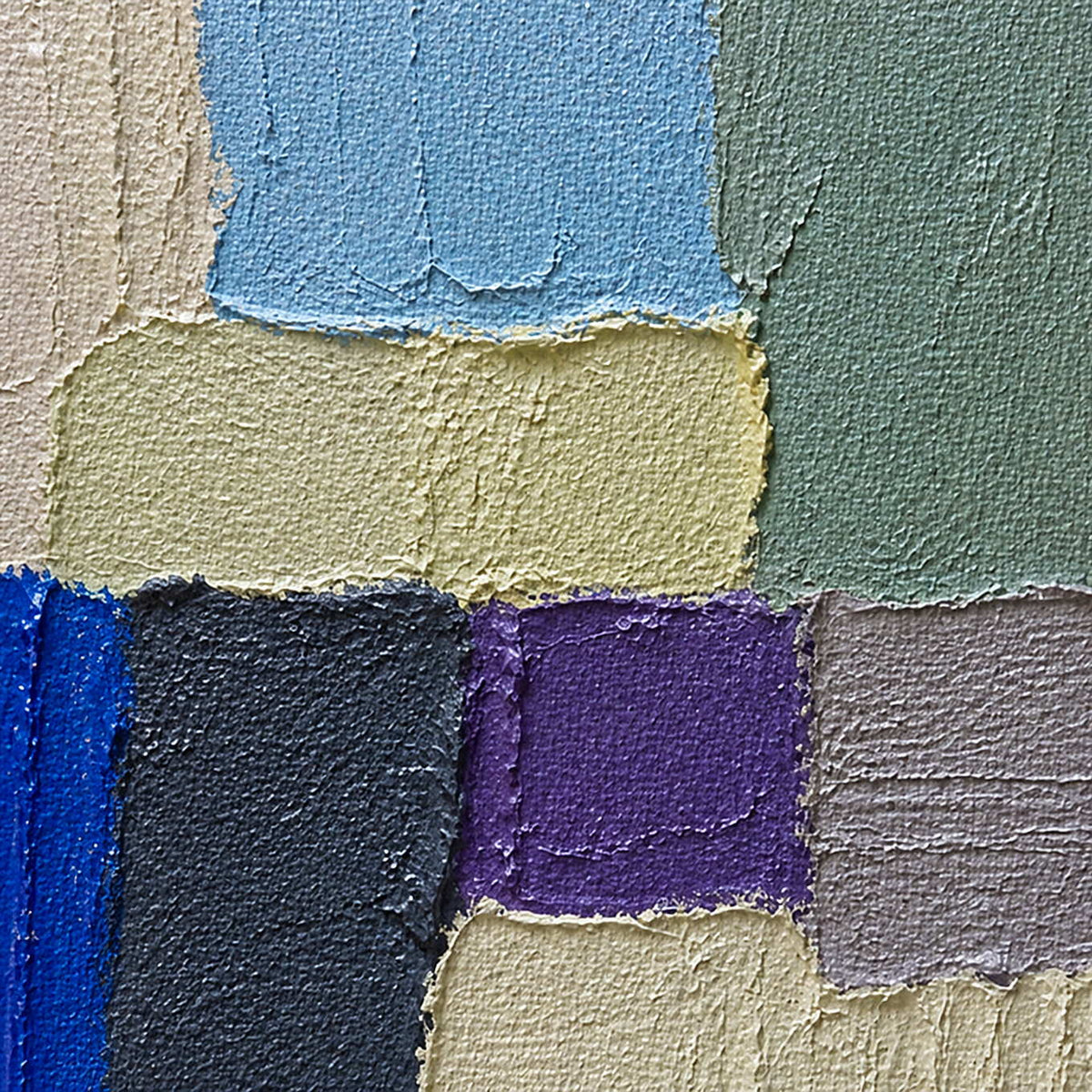 Close-up of raised blue, sage, ivory, lavender, and charcoal palette-knife blocks.