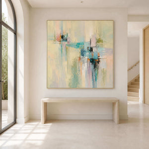 Square pastel abstract painting displayed above an entryway console.