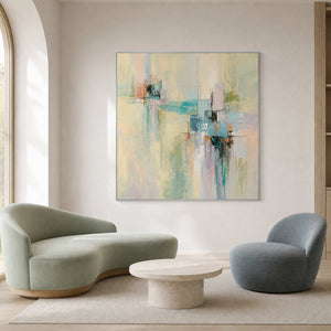 Colorful modern wall art paired with soft sculptural lounge chairs.
