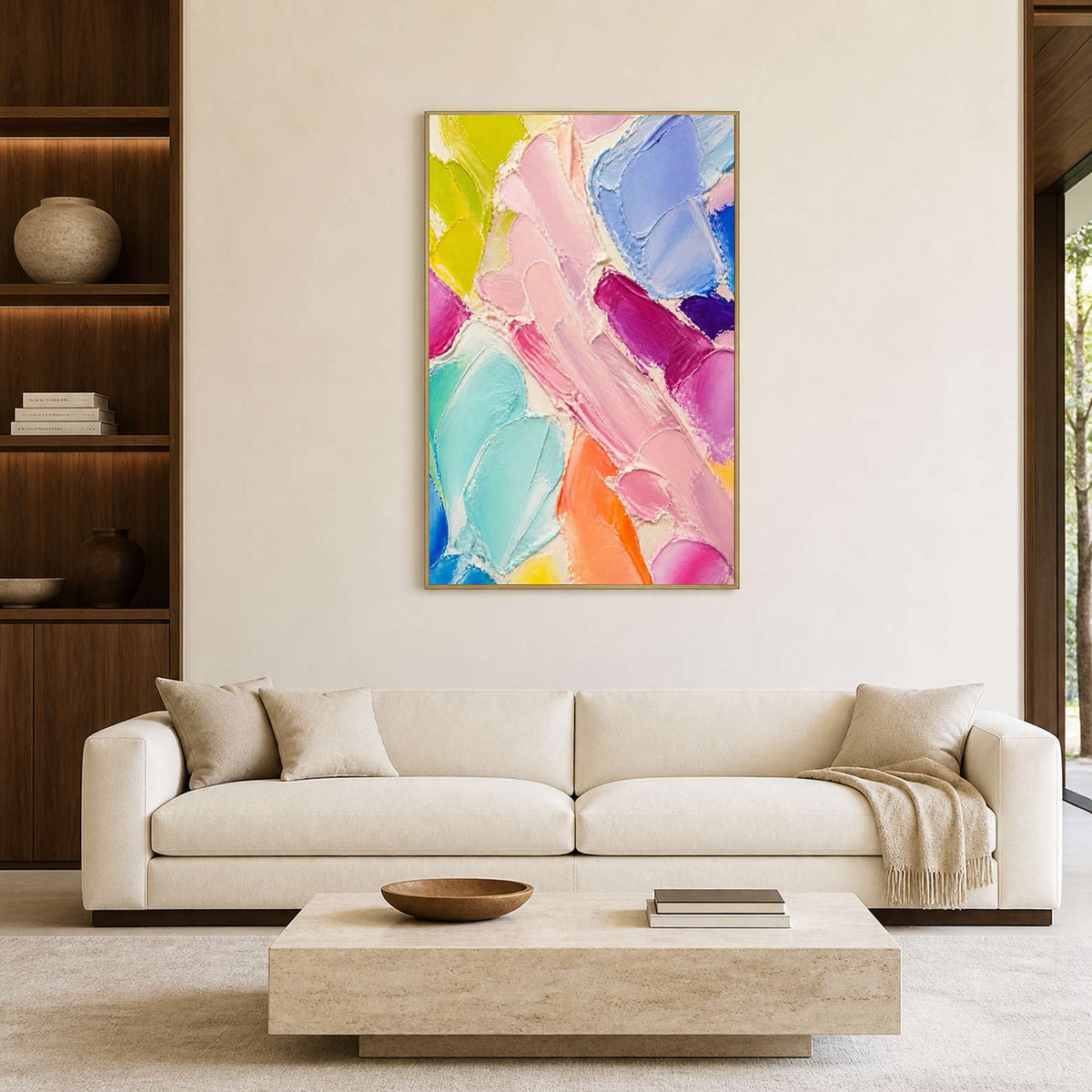 Colorful textured abstract wall art displayed above a bright neutral living room sofa.