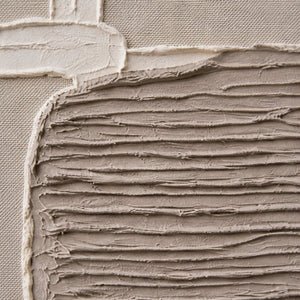 Close detail of layered taupe relief and woven canvas texture.