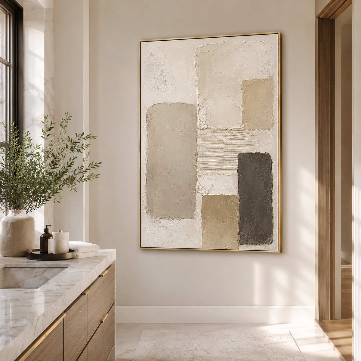 Soft neutral textured art in a serene bathroom space.