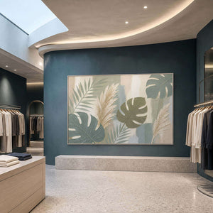 Sage leaves and ivory pampas grasses wall art in a contemporary commercial lobby.