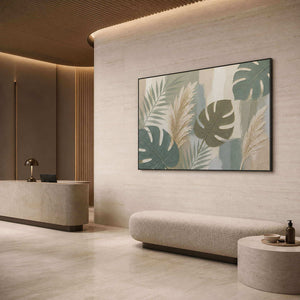 Sage leaves and ivory pampas grasses wall art in a contemporary hospitality lounge.