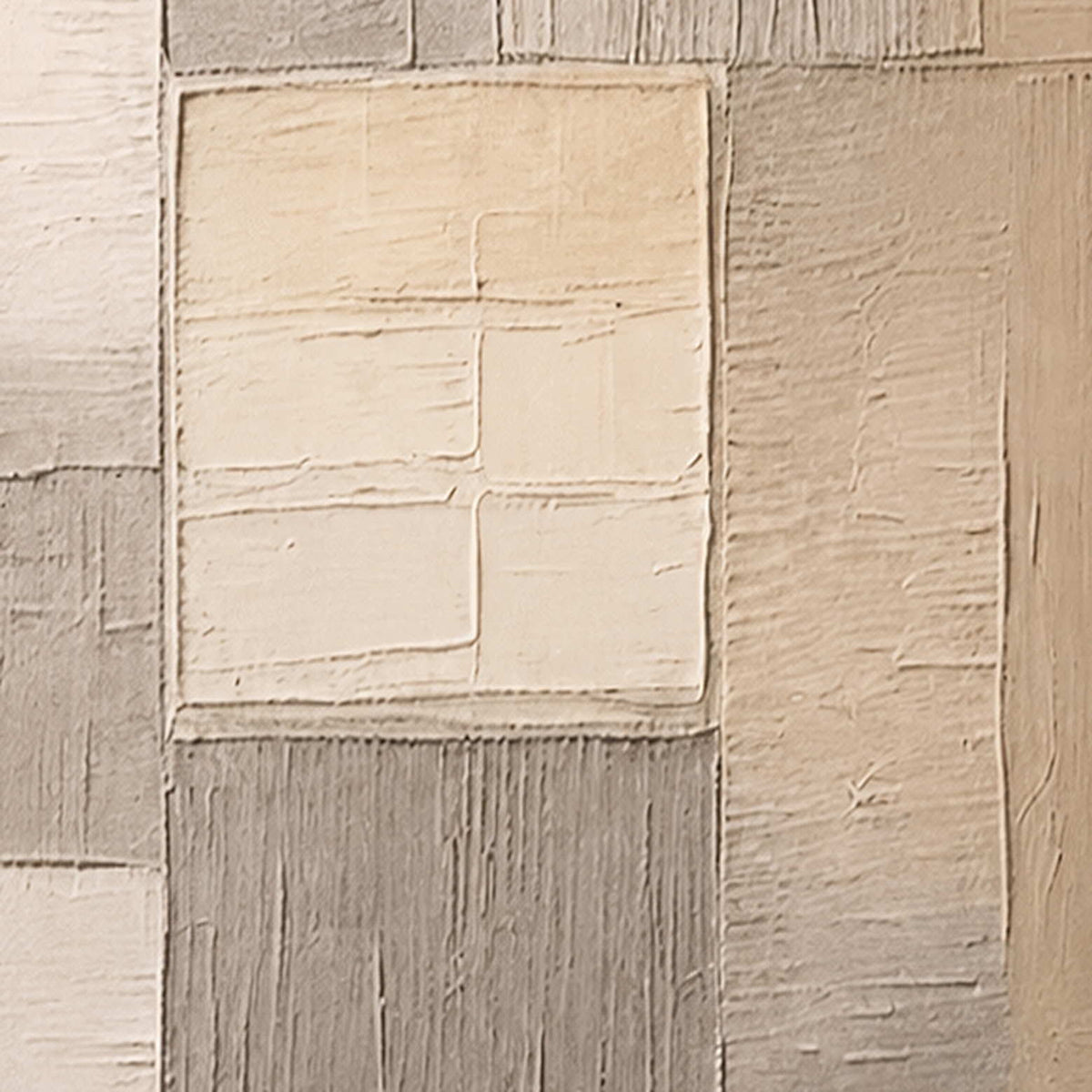 Close detail of raised cream rectangles and fine grooves across taupe patches.