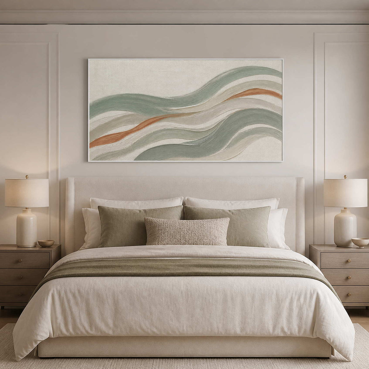 Sage and ivory coastal wall art styled above a neutral bed.